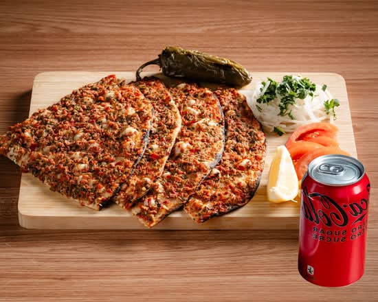 Lahmacun board with onions, lemon and tomato